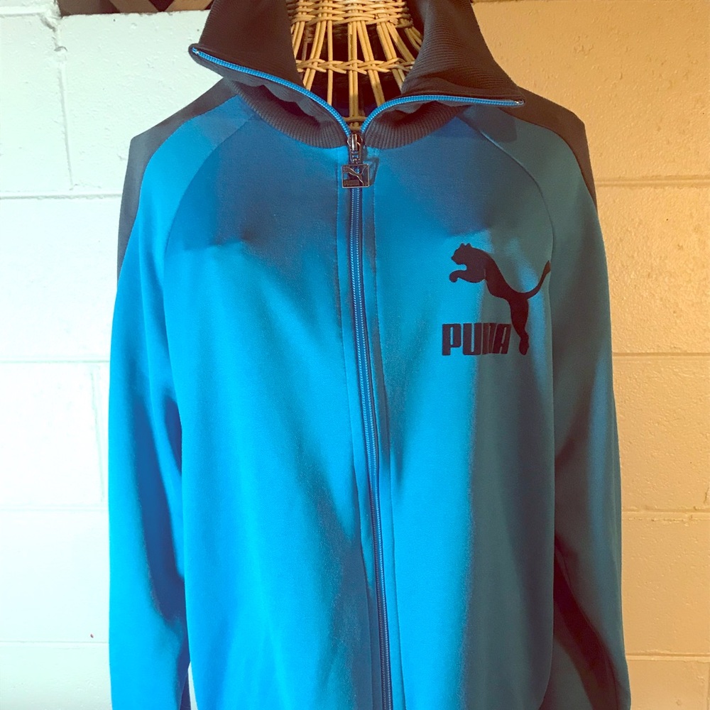 Puma zip up warm up jacket.
